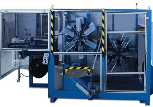 Solid wall pipe coiling and strapping machine